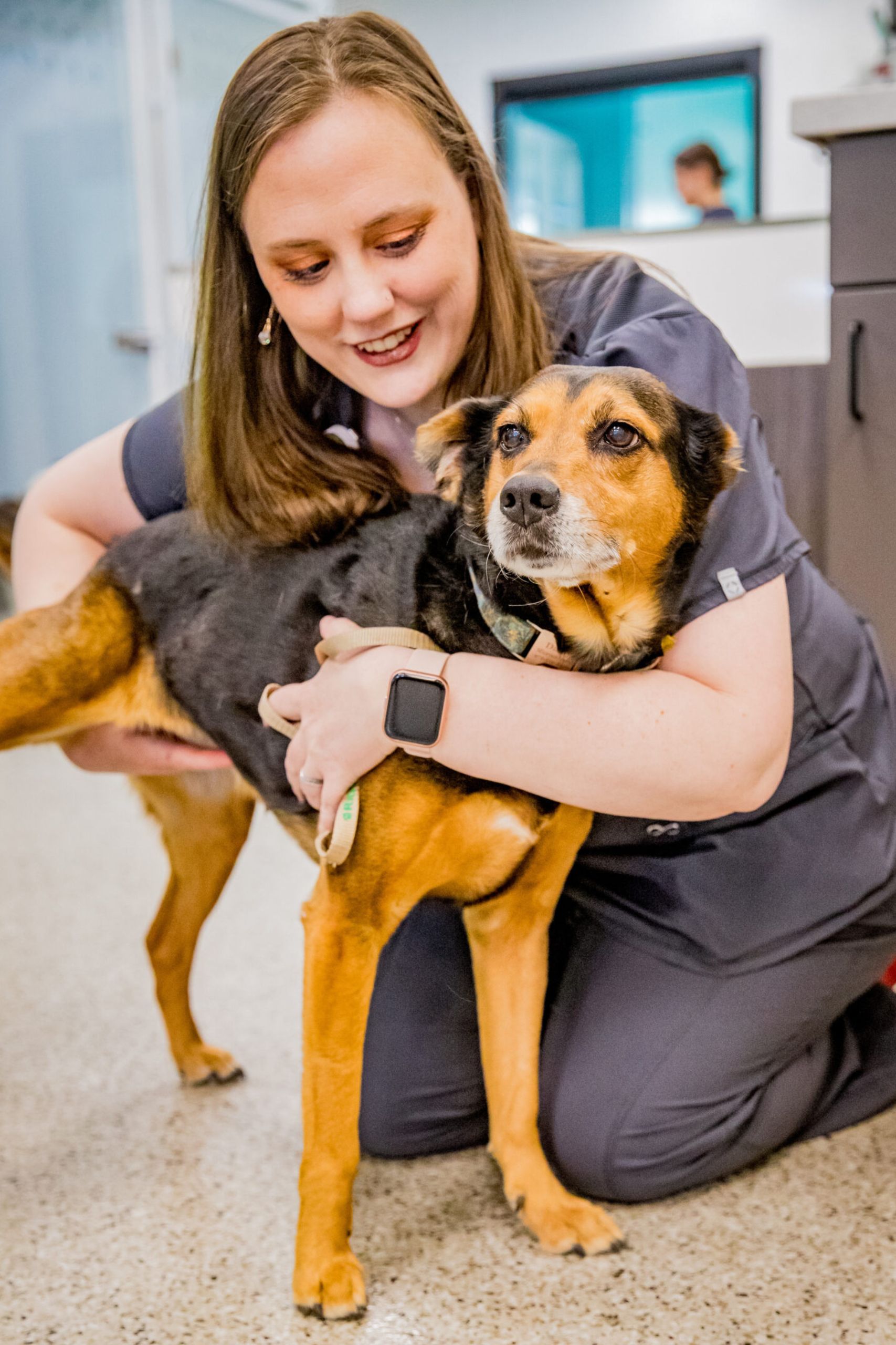 Ashley-Kendall-Photography-RVCn a person holding a dog